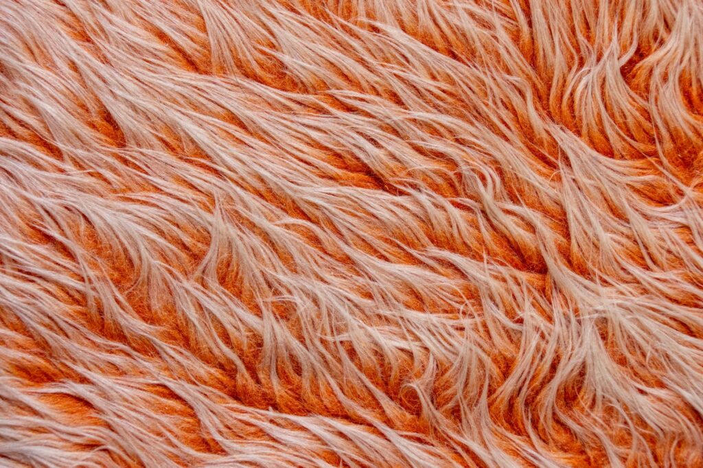 close up of vibrant orange textured fabric